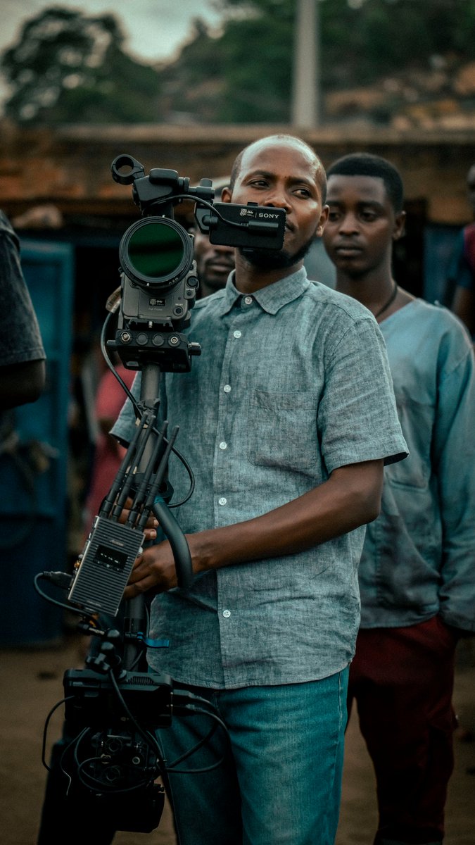 AdmaRwanda's tweet photo. A recent music video production by ADMA grads, including Cedric (production company), Nailla (director), Mike (steadicam), &amp; student John got to learn "on the job" as a production assistant.

Proud of our grads in the industry, &amp; their efforts to bring students along with them. https://t.co/orycpqqQTg