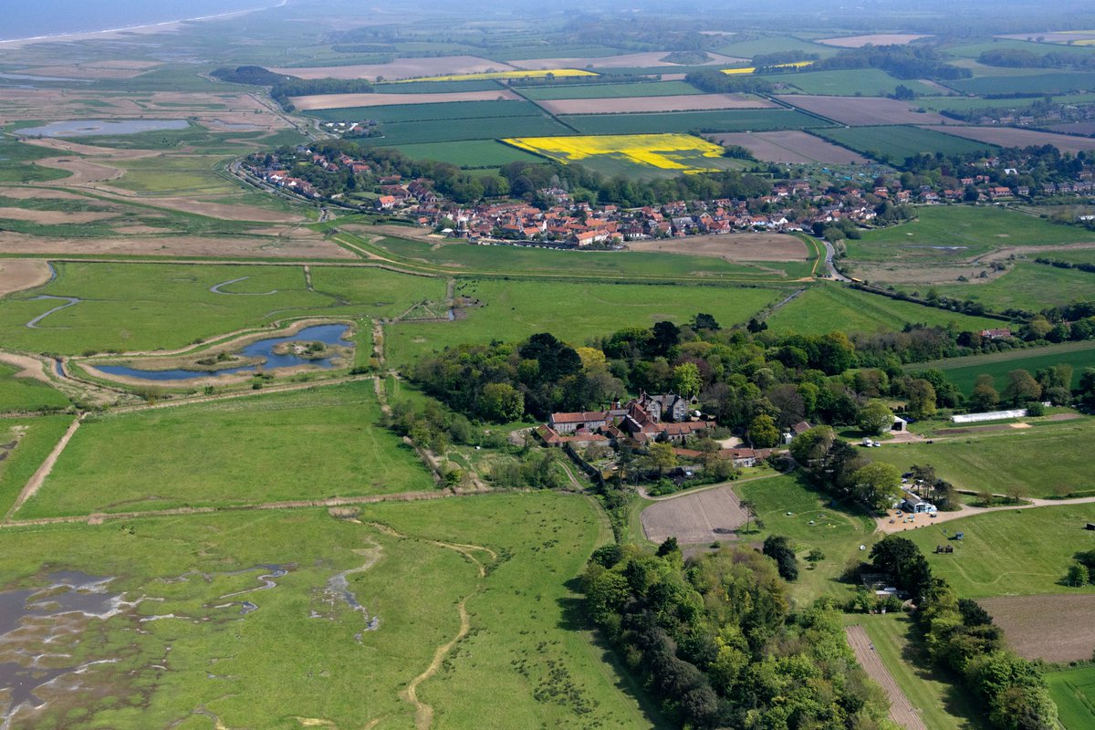 johnfielding001's tweet image. Looking east above Wiveton Hall, over the River Glaven valley and towards Cley. Norfolk aerial image #WivetonHall #Cley #aerial #image #Norfolk #RiverGlaven