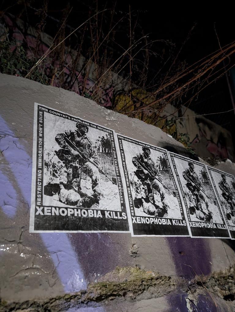 "Xenophobia kills. Restricting immigration won't solves this country's problems. The refugees are our leaders scapegoats"
Posters seen in Des Moines, Iowa