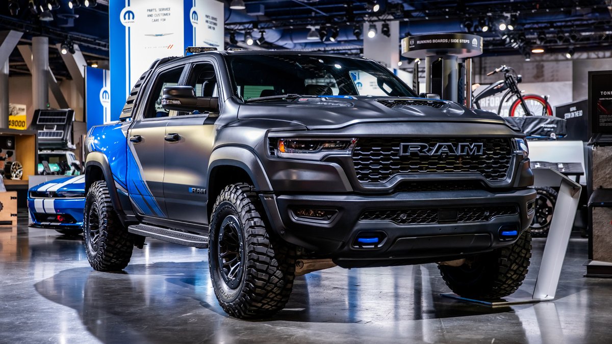 OfficialMOPAR's tweet photo. The Ram 1500 RHO concept is made of muscle, inside and out—a RamBar, 37-inch tires, & Mopar® Blue bodyside graphics. It’s also powered by a 3.0-liter Hurricane H/O SST engine, giving this build 540 horsepower and 521 lb.-ft. of torque. See more: https://t.co/3qhwn0ItEb
#SEMA2024 https://t.co/z3cQ6CPAS8