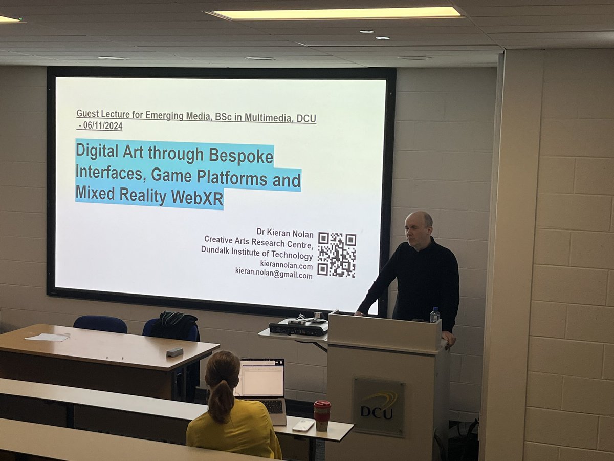 Marcos Dias (@mpdias) on Twitter photo Fascinating guest lecture given today by my colleague Dr. Kieran Nolan (DkIT) to the students from my Emerging Media module on Digital Art through Bespoke Interfaces, Game Platforms and Mixed Reality with examples from his work practice. <a href="/DCU_SoC/">School of Comms DCU</a> Fascinating guest lecture given today by my colleague Dr. Kieran Nolan (DkIT) to the students from my Emerging Media module on Digital Art through Bespoke Interfaces, Game Platforms and Mixed Reality with examples from his work practice. <a href="/DCU_SoC/">School of Comms DCU</a>
