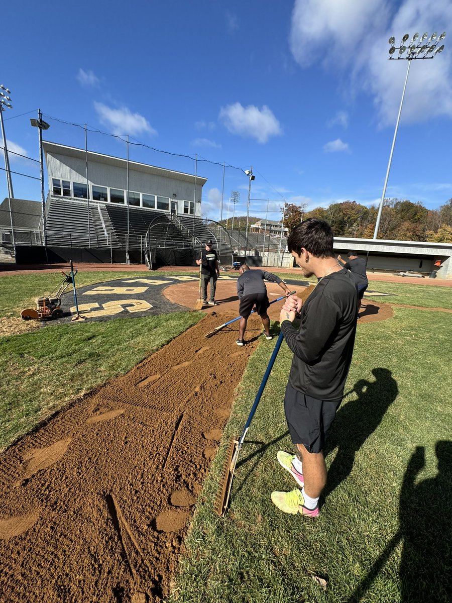 FerrumBsbll's tweet photo. Coach and his players working hard getting the field in pristine condition in time for the upcoming season! GO PANTHERS 🐾 https://t.co/iiupEl59HH