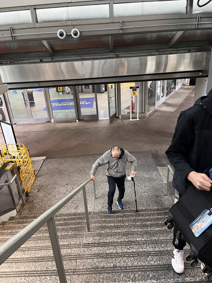 RowleyChicago's tweet photo. @ChicagosMayor you are asking us to pay more property taxes while we have to put up with this nonsense at Midway airport!  I was told that the elevator and escalator have been out for 10 days!  While standing there I was watching this elderly man trying to maneuver the stairs!! He had a suitcase that a young man helped take up for him!  I had to carry my bags down and I’m 66!  🤬
