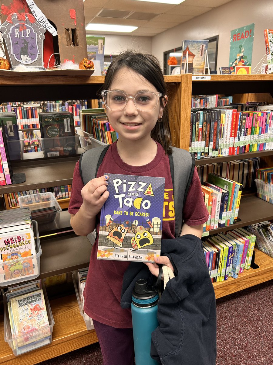This <a href="/D45Westmore/">Westmore School</a> 4th grader is thrilled to have won an autographed copy of, Pizza and Taco: Dared to Be Scared”. Her story about an original dynamic duo - just like Pizza and Taco - earned her this prize, signed by the amazing @SShaskan! #SchoolLibrarian #WestmoreWildcats