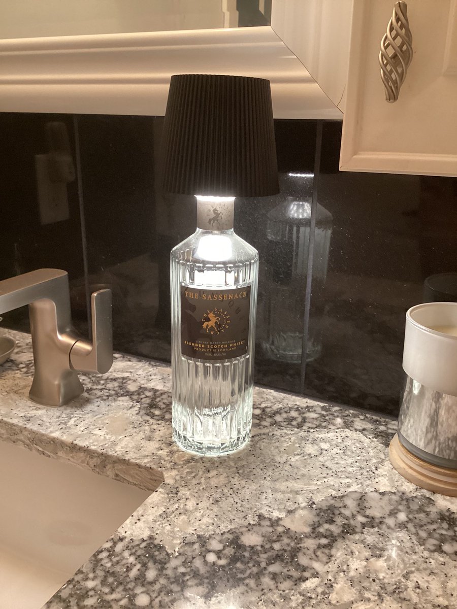 For anyone with empty Sassenach Whisky bottles, find them too pretty to throw away &amp; aren’t crafty (like me) check this out at Amazon.  
The shade comes in white, black, gold &amp; silver. Just pop it in the bottle, tape the top &amp; the rechargeable light comes on. $16.00
Cool, huh?