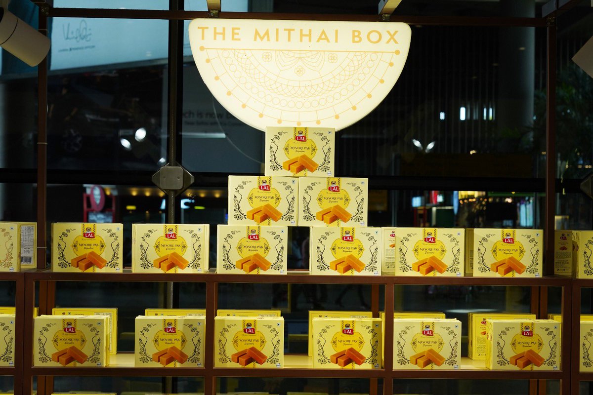 CSMIA_Official's tweet photo. *Sweeten the reunion!* Before you exit, grab a box of happiness for your loved ones from The Mithai Store and make the homecoming even sweeter! Outlet located at Terminal-2, Arrivals.
#SweetTreats #BoxOfHappiness #AirportShopping #MumbaiAirport #GiftOfJoy #BringHomeSweetness https://t.co/zXjfuX0j4E
