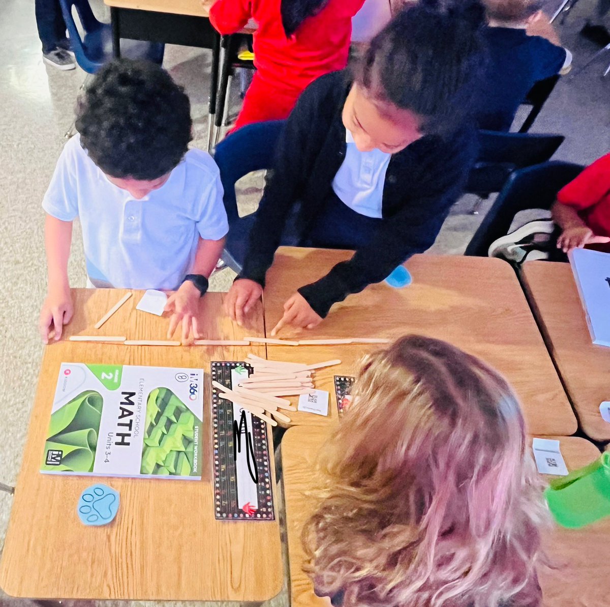 Our 2nd grade Smarties are learning how to measure using nonstandard units. #IMmath #coteaching @CaraCaudill <a href="/MrIceClass/">Mr. Ice</a> <a href="/GHSPrincipal/">Kim Slusher</a>