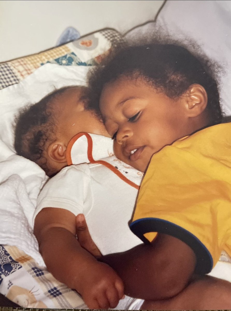 Throwback to when I had only two children. I turned my back and Isata had climbed onto the bed for a good cuddle with her little brother, Braimah. Who, remarkably, survived 😂❤️ All will be well if we stay connected 💐