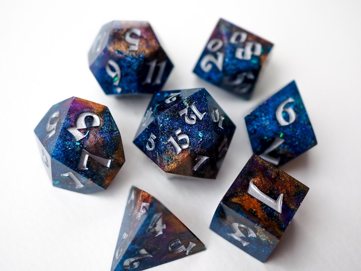 merlinsdices's tweet photo. I didn’t show you here my new designs🩵😍  I hope you like them💫 #dice #resindice #handmade #handmadedice https://t.co/aS5qKr3L8r