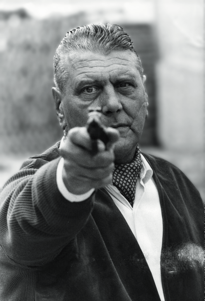 Mossad operator and former SS-Obersturmbannführer, Otto Skorzeny, confronts a photographer. 
1960