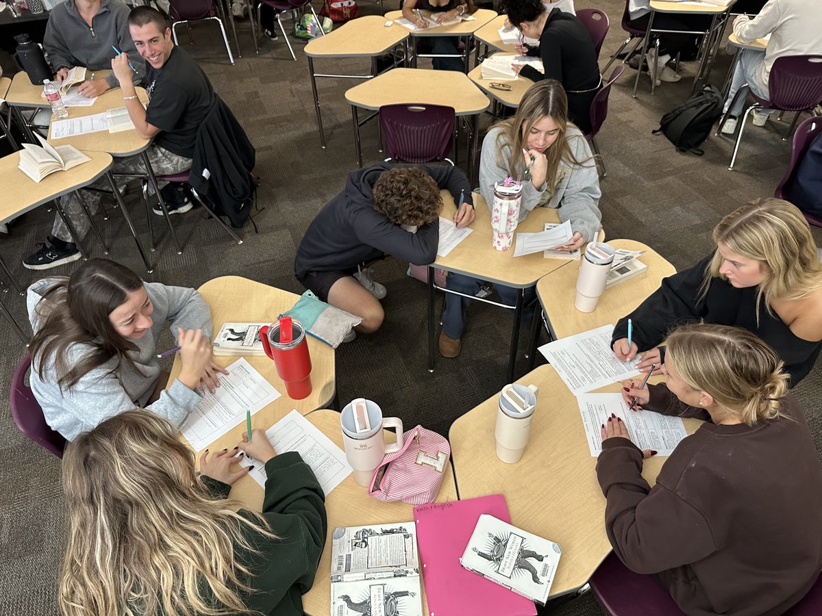 Mrs. Kadavy’s College English scholars working collaboratively to analyze characterization in Brave New World and develop interpretive claims. Look at all those scholars with their books cracked open! 🔥❤️