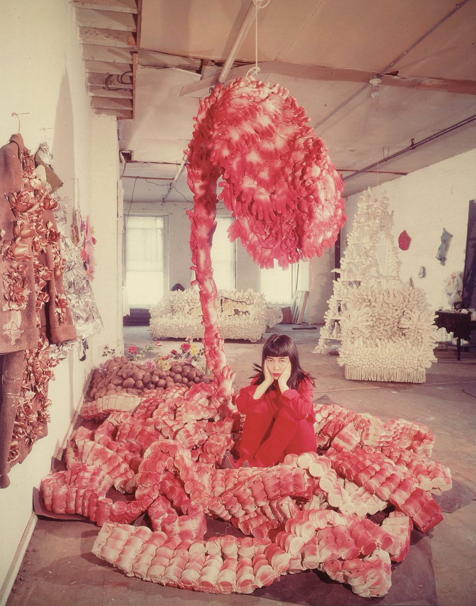 colettebrn's tweet image. Yayoi Kusama in “My Flower Bed,” 1962