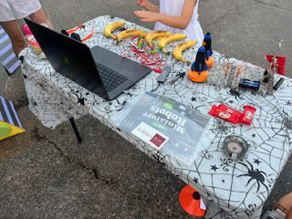 DCoaDLab's tweet photo. During a frightfully fun community outreach event the DCoaD Literacies Lab helped young explorers delve into the inner workings of a mesmerizing robotic candy dispenser, learn all about circuits and robotics, and receive materials to build their own bots at home! https://t.co/pXBBn54bgJ