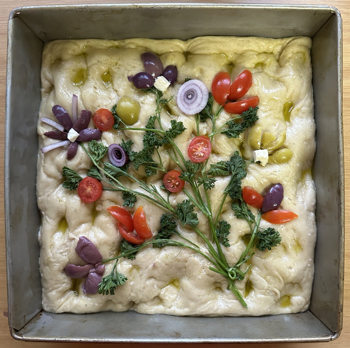 chat does this focaccia art look like a bunch of wild flowers or should i psychologically torture myself to breaking point