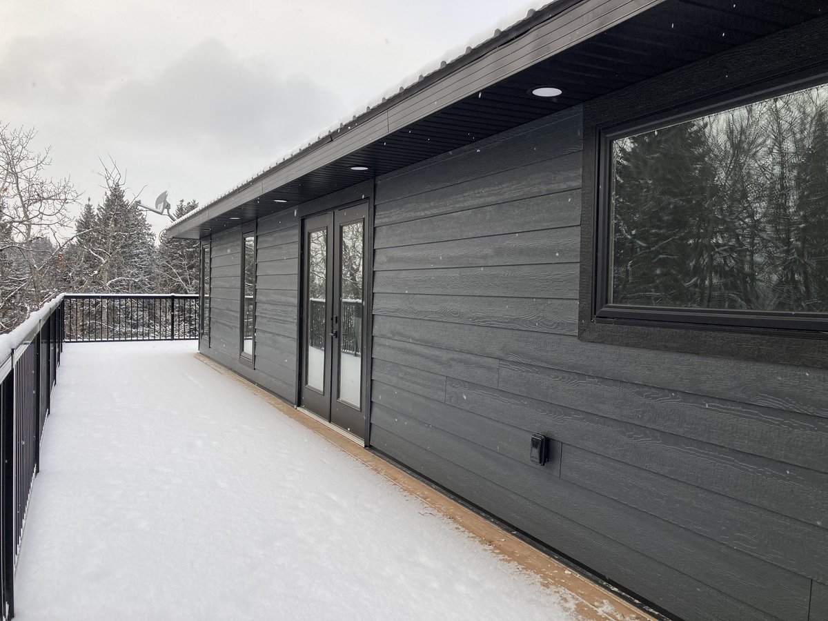 Do something you like. Be bold! These homeowners went from white &amp; brown to Midnight Shadow &amp; Black! Their home is stunning! 

#bullseyecontracting #renovations #lacombe #ponoka <a href="/LPSmartSide/">LP SmartSide</a>