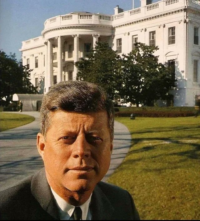 10. John F. Kennedy in a selfie-style picture in front of the White House in 1962