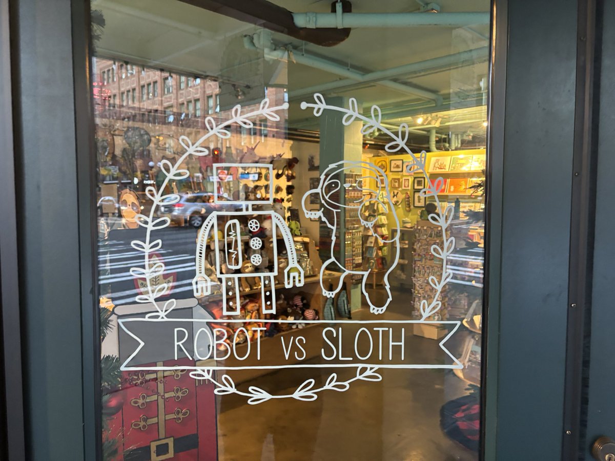 JLemonsDC's tweet photo. Seattle has you covered for sloth content and sloth themed Xmas gifts. @senatorshoshana https://t.co/AqlrolDBoz