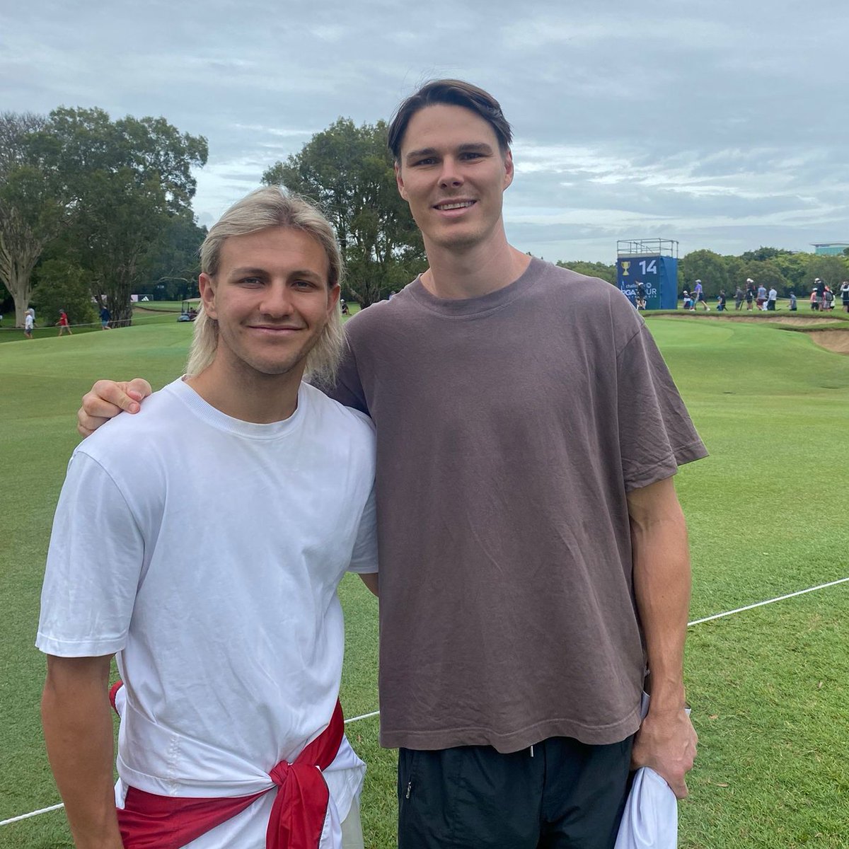 PGAofAustralia's tweet photo. We've got a couple of 🦁loose at @RQGOLF.

Great to have @AFL premiership-winners Kai Lohmann and Eric Hipwood on course to watch our stars in action.

#AusPGA | @brisbanelions | @visitbrisbane https://t.co/9pl0M3tym2