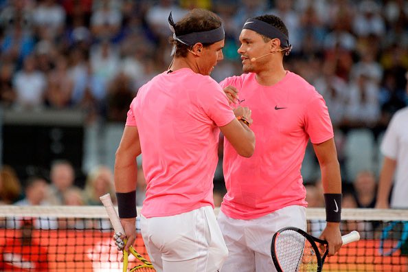 Trevornoah's tweet photo. 🎾 Today, tennis lovers worldwide received news that we all expected, but always dreamed we could somehow avoid. Because today, @RafaelNadal announced his official departure from the sport. 

For anyone who’s ever had the pleasure of watching this man grace a court, they will know that his mastery has forever altered our perception of what tennis can be. His athleticism transformed a clay court into a Gladiators arena where his forehand felt less like a tennis technique, and more like the warrior brandishing the broadest sword. Rafa has been such a prolific figure in the sport, that he somehow even managed to elevate the art of headband adjustments and delicate wedgie removals. 

On a personal level, I remember playing in our last doubles tennis match together. Rafa and I were seated in the change room, and I turned to him with tears in my eyes and said “Rafa, I think this is going to be my last tennis match. I think I’m retiring“ And I’ll never forget Rafa turning to me and saying, “Trevor, I didn’t even know you played tennis.” He always knew how to cheer me up. And I’ll never forget that. 🥲

Rafa, as you step away from the spotlight, the world of tennis loses a monumental figure, but your legacy of passion, perseverance, and the occasional perfect pirouette on the baseline will live on. Here’s to endless sunny days ahead, fewer blistered fingers, and maybe a match where the score doesn’t matter.

#VamosRafa #VivaElMatador