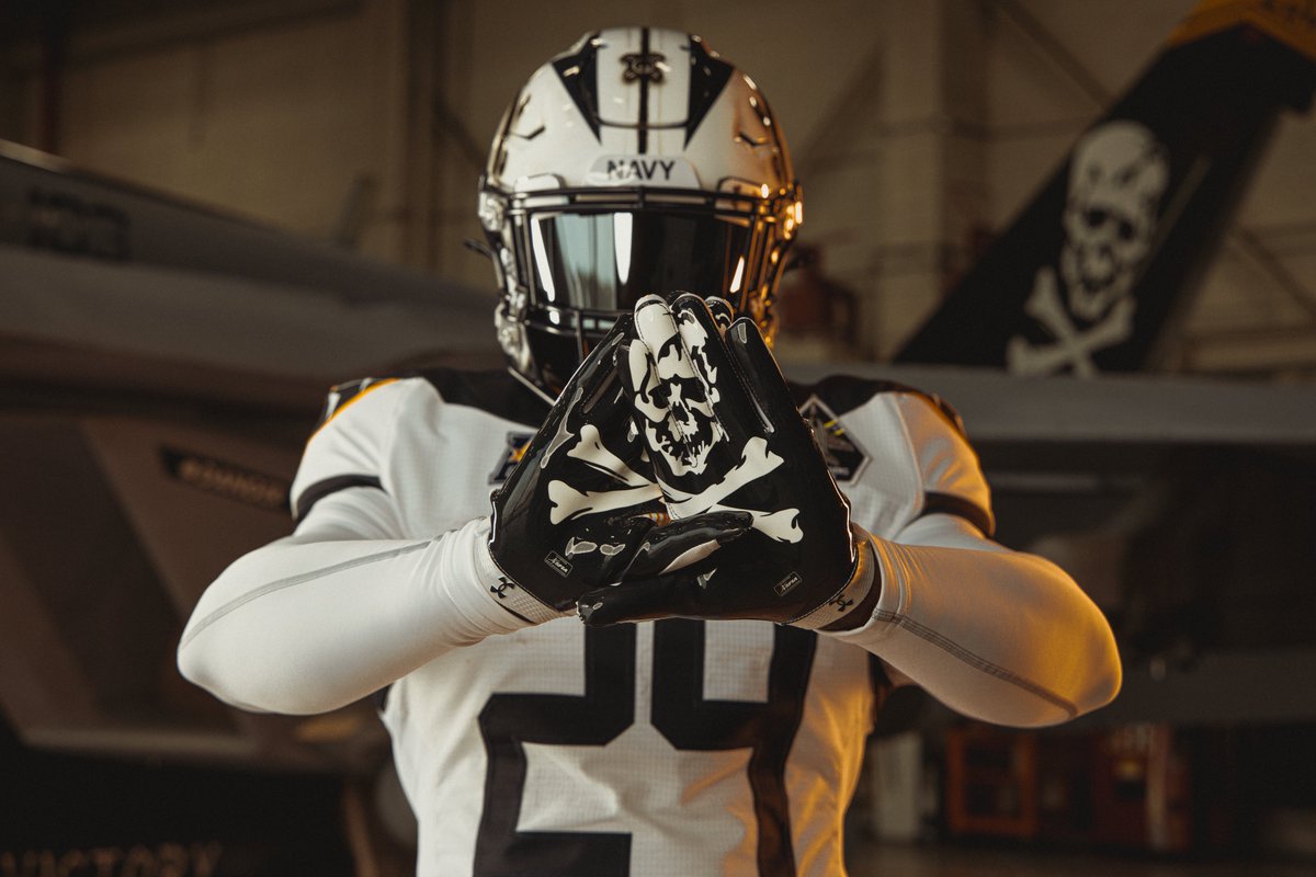 NavalInstitute's tweet photo. Navy Athletics today unveiled the 2024 Army-Navy game uniform that honors all the fighter squadrons that have bore the name "Jolly Rogers". VFA-103 is the current squadron carrying on the tradition of the Skull and Crossbones. The 125th Army-Navy game will be played on Dec. 14. https://t.co/DV7SxnLgz7