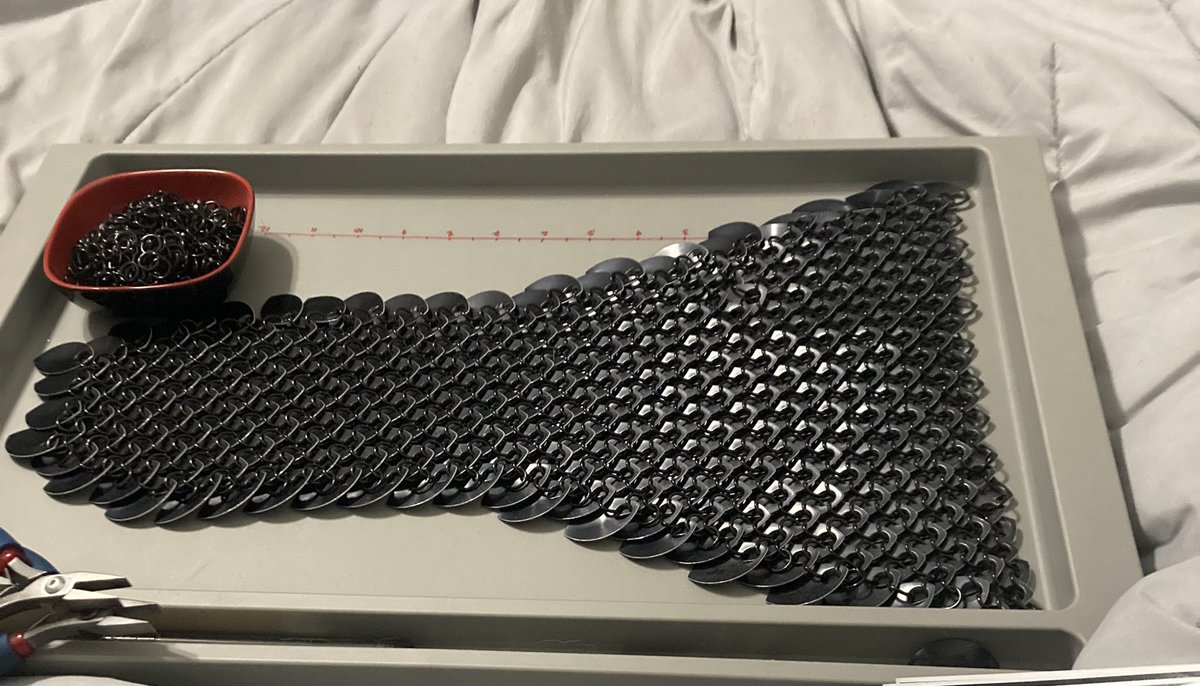 Metal_Phoenix0's tweet image. Working on some scalemaille while my stupid body fights me. Send all the good vibes this way so I can get this done ❤️ #chainmaille #metal #scalemaille #renaissance