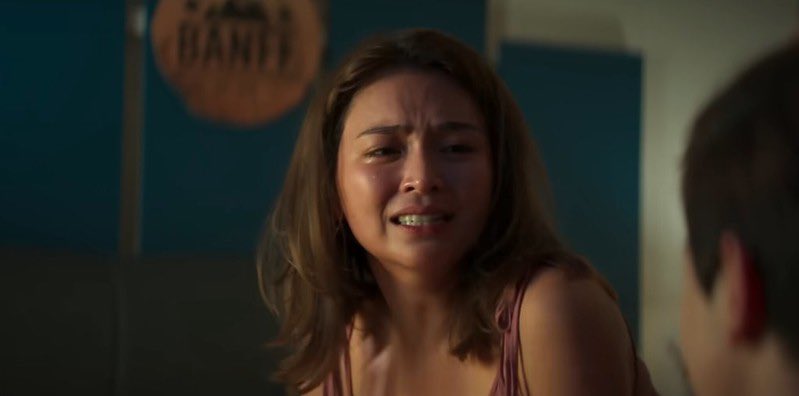 AltheyuhMoves's tweet photo. The Magic of Modern Day Superstars- a review for #HelloLoveAgain 

sorry mahaba ulit. 

I felt the colossal effect of our talented, modern day superstars of Kathryn Bernardo and Alden Richards.  

This film was carried by the two of them.  I feel given to lesser actors, the film would be flimsy and may not have the same impact.  

But they have a certain cinematic magic that stirs to our hearts.  Kaya yan box office hit, it is because of them. 

To start, Hello, Love, Goodbye is  one of my favorite romantic dramas.  I loved the tale of the diaspora, I love the modern take of love,  I love the strong-willed heroine in Joy Marie Fabregas, and her most relatable story.  So let us just say I was anticipating this.  and sort of dreading it too. 

So now from the bustling streets of Hong Kong, we move to the vibrant, Calgary, Canada.  

I did like the non-linear story-telling which had us playing guessing game, somewhat piecing the puzzle of the failed relationship of Ethan and Joy or now —-“Marie” as she calls herself in the current timeline. 

Some say Marie’s Canada diaspora story seems so exaggerated here  —- I have to completely disagree.  actually it is not, the West mindset of the never-ending hustle is real. 

Especially for Filipino immigrants that end up in the West.  I have seen my parents and their peers go through it.  Chasing the paper is real.  Money is out there to be made and the Maries of the world is definitely a real story. 

  I like the angst, I like how realistic the problems were especially when the film steered into issues when the pandemic hit.  I like how things connected from its predecessor and how we got to a new chapter of their (un) love story. 

But unlike HLG wherein the supporting characters felt real, hilarious, and even gritty —- this felt contrived.   

Hindi ako natuwa sa new characters and friends ni Marie.  Hindi ako natuwa sa treatment ng Canada story until we get to the actual love story. 

What made HLG strong was the quiet restraint of telling their story, the slow-burn kilig, and the effective world-building they gave us.  It all felt so human.  

In HLA, there was no restraint.  It was all pedal to the metal; kulang nalang laugh track.  The moments are loud and shrill.  Like punchlines to our face. With one instance happening to the next.  

The direction is still good but it took a bit of footing before the story took off. 

But once it did take off, I was reeled back in.

Special props to Joross Gamboa. He is such an effective comedian and scene stealer. 

Now let us get to the excellent part of the film and the real magic of why this film has packed theaters even here in the US.

It is the juggernaut superstars in Kathryn and Alden Richards.  Their chemistry is natural and effortless.  Their performances raw and poignant.  They know how to ANGST.  They will shatter your heart to pieces and work the scene into kilig surges minutes after.  

Kathryn Bernardo as Marie is beautiful and disarming.  Strong-willed and controlled emotions to the brim.  So when  she actually breaks down we break down with her.  Like it was not just heartbreaking but it almost felt like she tattered her soul.

Alden Richards as Ethan is her equal match on-screen.  He goes from brash and prideful to restrained and remorseful effectively.  His eyes tell so many stories of heartbreak, guilt, pride, rage, and love.

They are magic together.  The chemistry is blazing, emotions drowning us, and tension that can cut through a knife.  Their chemistry adds depth to the film.  They are captivating and thrilling together - and they are what made the film for me. 

story-wise- I am still a bigger fan of HLG but this is a bigger and better KathDen. 

Overall, it was enjoyable,especially when the film goes to define what home really is in the world of the Filipino diaspora.  

it is not where is your home but WHO.

Worth a watch.