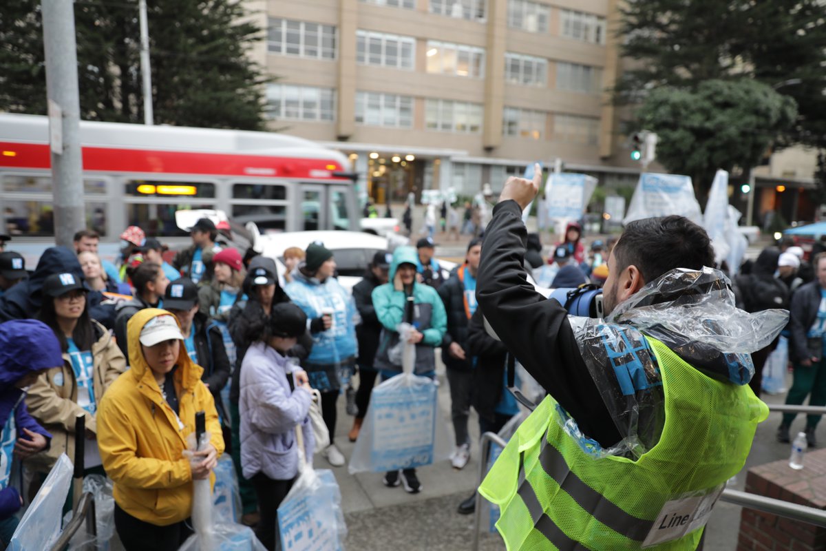 UPTECWA's tweet photo. The rain didn’t stop UPTE researchers, healthcare professionals, and technical workers from showing up and out! We’re making it clear to UC: Stop bargaining in bad faith and using illegal, unfair labor practices. #UPTE #UnionStrong #UC #UofCalifornia #ResetUCPriorities https://t.co/Cn5JjX9Zhp