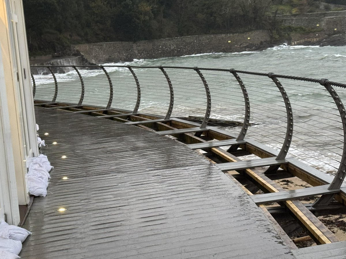 Crazy morning filling and putting sandbags on terrace. Howling gale and driving freezing rain.