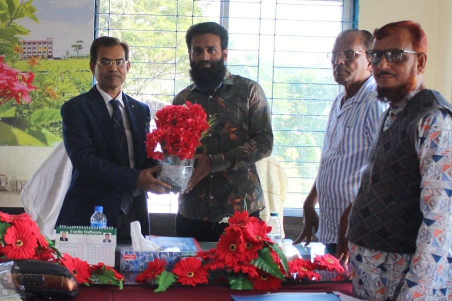 Chairman of the Governingbody, Hasan Al Bakar Masal, Floral reception  at GB meeting.