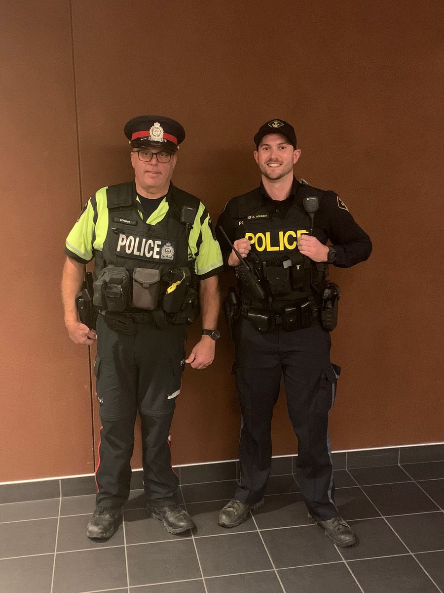 slbaltzer's tweet photo. Gearing up for retirement, LPS Community Foot Patrol officer, Constable Doug Schmidt took his son, OPP Constable Dave Schmidt for a walk-along downtown and in OEV. What a special day! Thank you both for your service and dedication to public safety! @lpsmediaoffice @OPP_WR @OPP_CR https://t.co/UIs5fTUvEd