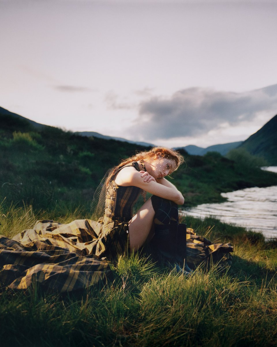 Dior's tweet photo. Scottish meadows cradle moments of pure #DiorCruise 2025 poetry by photographer Camille Lemoine for the new #DiorMagazine, Issue 48. Discover more https://t.co/X2NQl7CRU2. https://t.co/o5sDFSbJ8T
