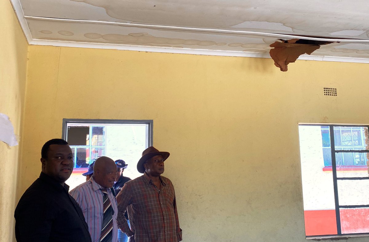 UNZimbabwe's tweet photo. .@UNZimbabwe Chief @EdwardKallon visited Berejena high school in Chivi Rural District #Masvingo to witness the impact of #LaNina: damaged roofs, ceilings, and textbooks forcing classes under trees. Urgent help needed to repair 11 schools before more rains cause further damage. https://t.co/rK0Shrdg5U