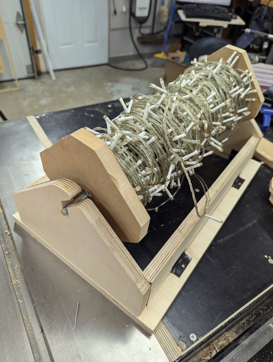 InventorEvan's tweet photo. I built Prototype 3.0 of the holiday light spooling system yesterday -- I think this is getting close to the final design.  It works pretty well but needs a few more tweaks.  Today on stream I'll be testing the changes for P4.0 and testing them out.   #makersgonnamake #invention https://t.co/YwsTp05rNl