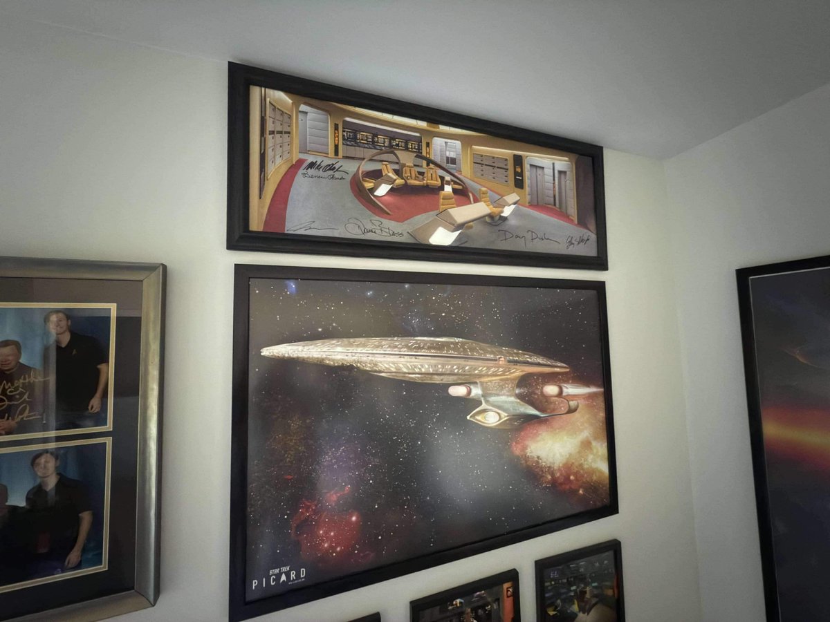 Mom and dad brought my <a href="/DaveBlass/">Dave Blass</a> and #StarTrekPicard production team signed Enterprise-D bridge picture to Myrtle for Thanksgiving. She’s a bit high on the wall. But this part of the man cave is complete.