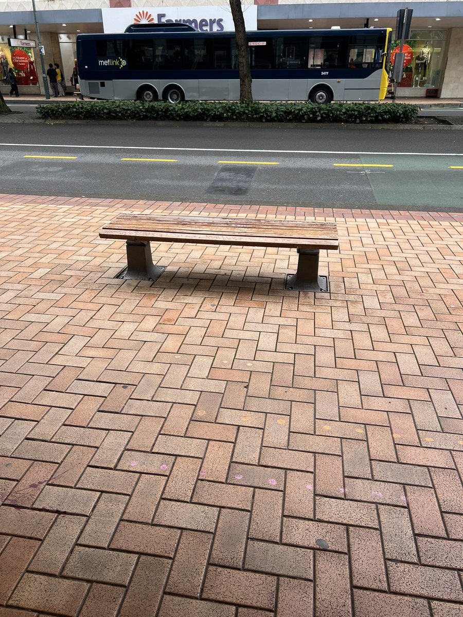 Another practical, user-led tour de force from the <a href="/WgtnCC/">Wellington City Council</a> planning dept. Bus stop seats at one of Wgtn most popular bus stops on Lambton Quay a metre outside of the veranda cover - exposed to the rain. So as useless as the proverbials in bad weather
