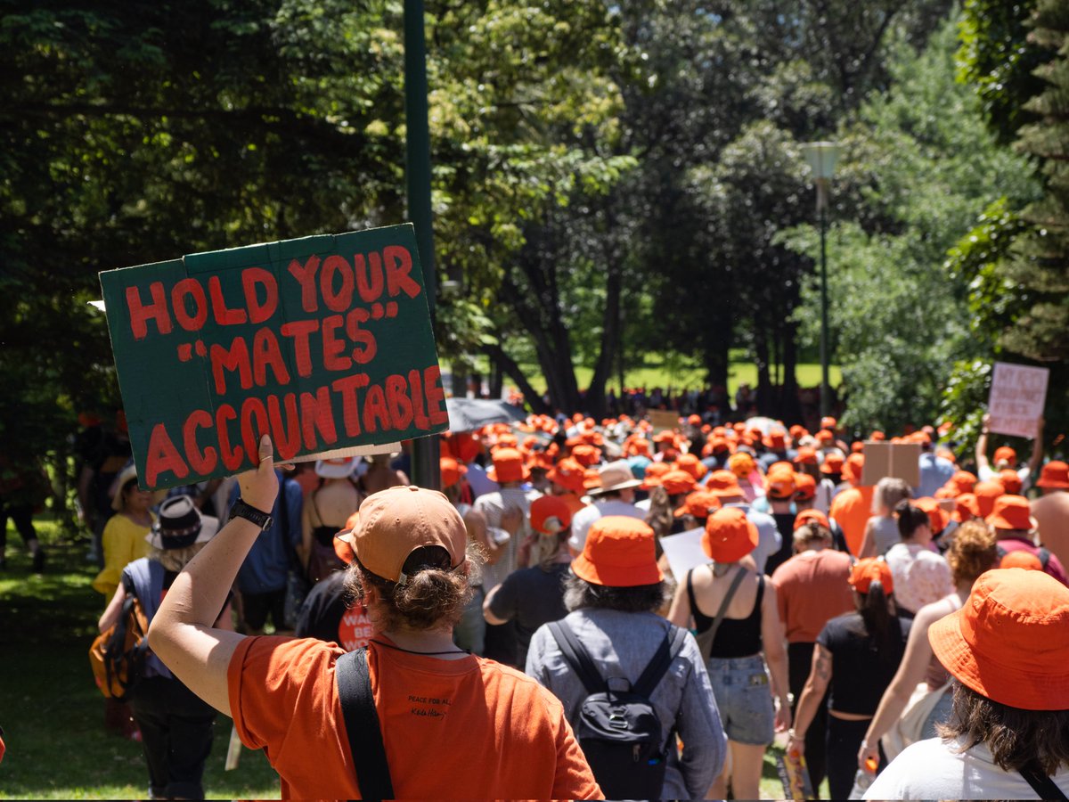 85 pairs of red shoes were left on the steps of Treasury Place as thousands partook in Respect Victoria's Walk Against Family Violence. A banner made for the rally showed an already outdated figure.