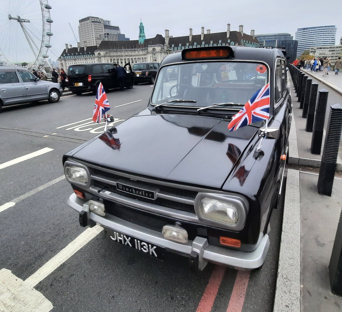 Black cabs, some old, some new, all now ranked up on Westminster Bridge for Remembrance Sunday, having bought veterans from various locations with <a href="/PoppyCabs/">Poppy Cabs</a> and will be taking them back after todays service. 
#remberancesunday