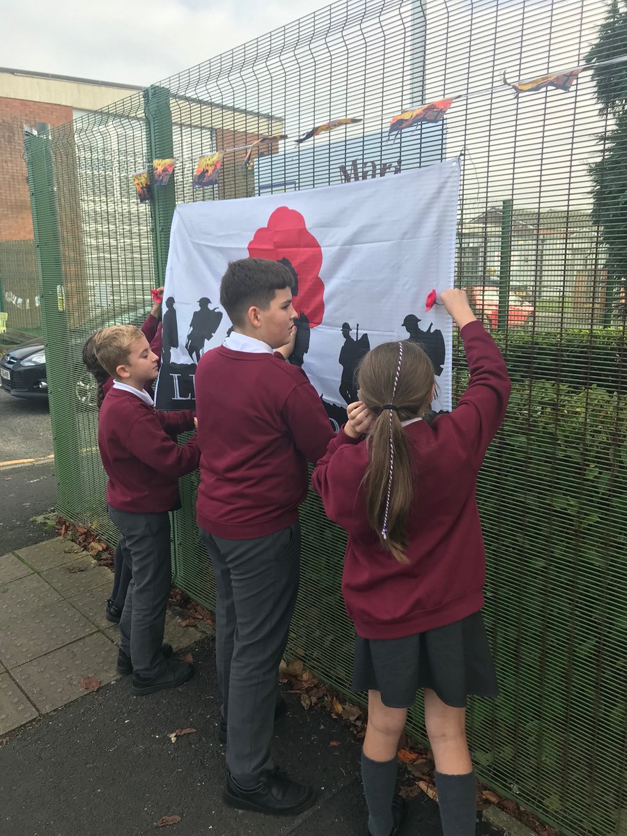 Our Caritas ambassadors helping to remind us to remember those lost to war