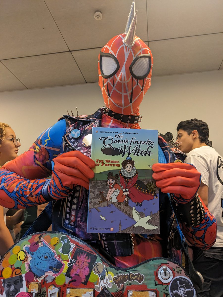 Beniswriting's tweet photo. Punk Spider-Man is a fan of The Queen's Favorite Witch! @PapercutzGN @MaltaComicCon https://t.co/3NYqv332PU