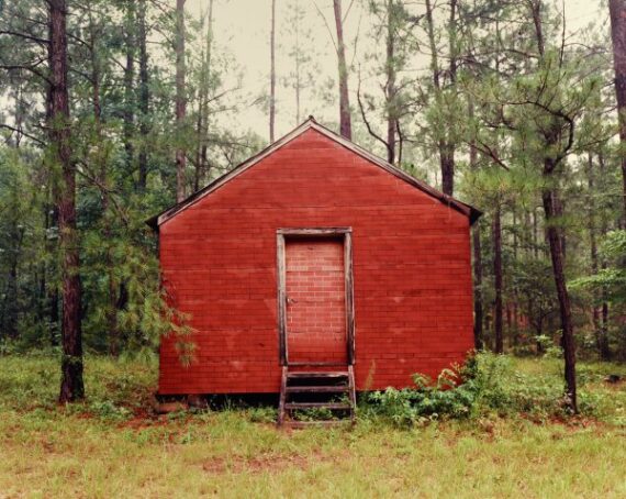 Microdisney - Singer's Hampstead Home (Virgin Records, 1987). The sleeve art features the William Christenberry photograph, "Red Building in Forest, Hale County, Alabama 1983."
