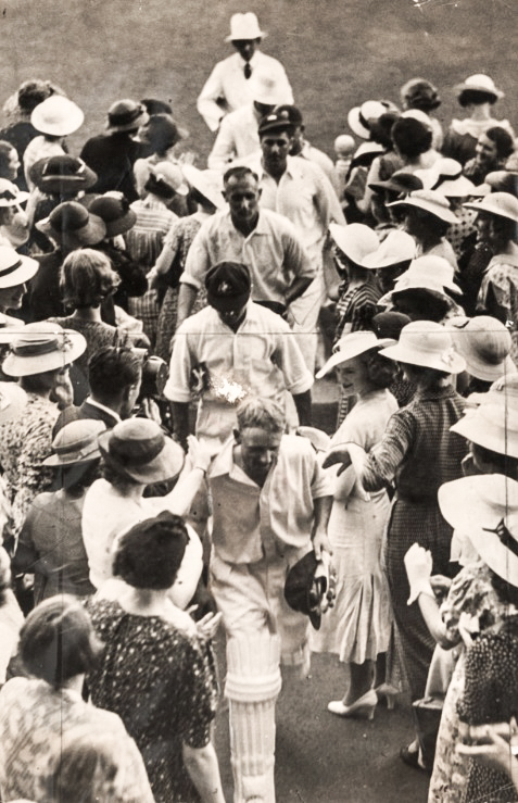 Don Bradman returns to the pavilion unbeaten on 165 at the end of the first day of the 5th and deciding Test at the MCG, February 26th 1937.  He added only four more the next morning. Australia made history by coming back from two down to win the series 3-2