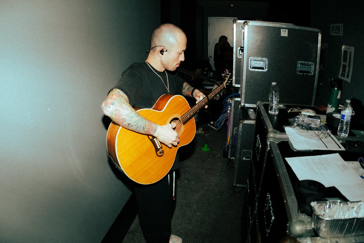 I started singing and screaming in Trivium around the year 2000 or so. When I first joined the already 2 week old local band Trivium, I was just the lead guitar player. 

When our original singer left, after fruitless searches for a singer, Travis said to me: “you’re gonna be the