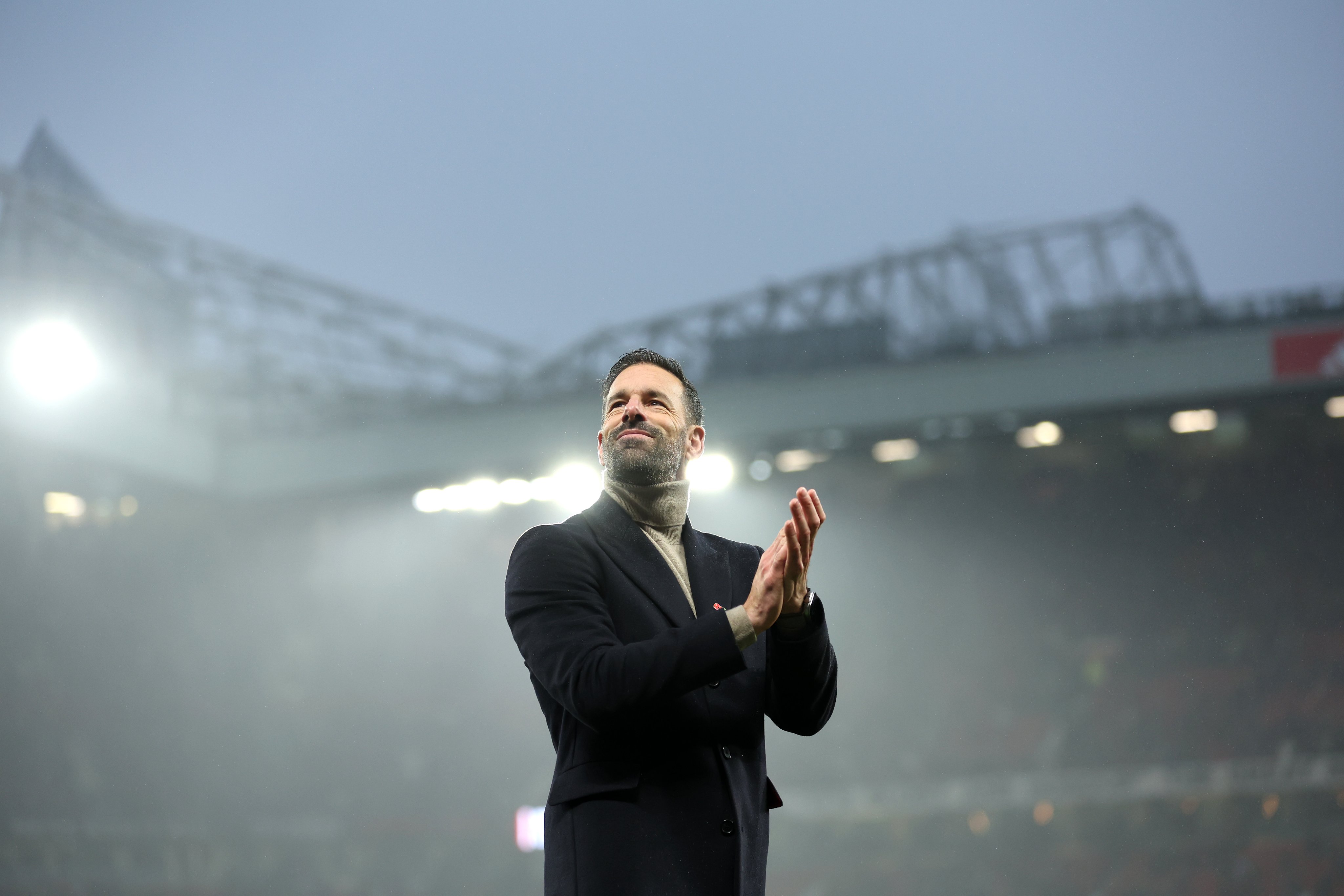 Ruud van Nistelrooy applauds the Stretford End after our win over Leicester.