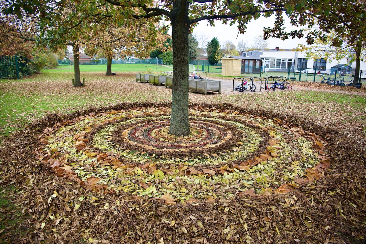 This amazing piece of natural art has been created by all the children from nursery to year 2 using all the different natural materials found on the school grounds. The children worked with the artist James Brunt. This helped the children earn their 'Visitors' Delta Star Card.