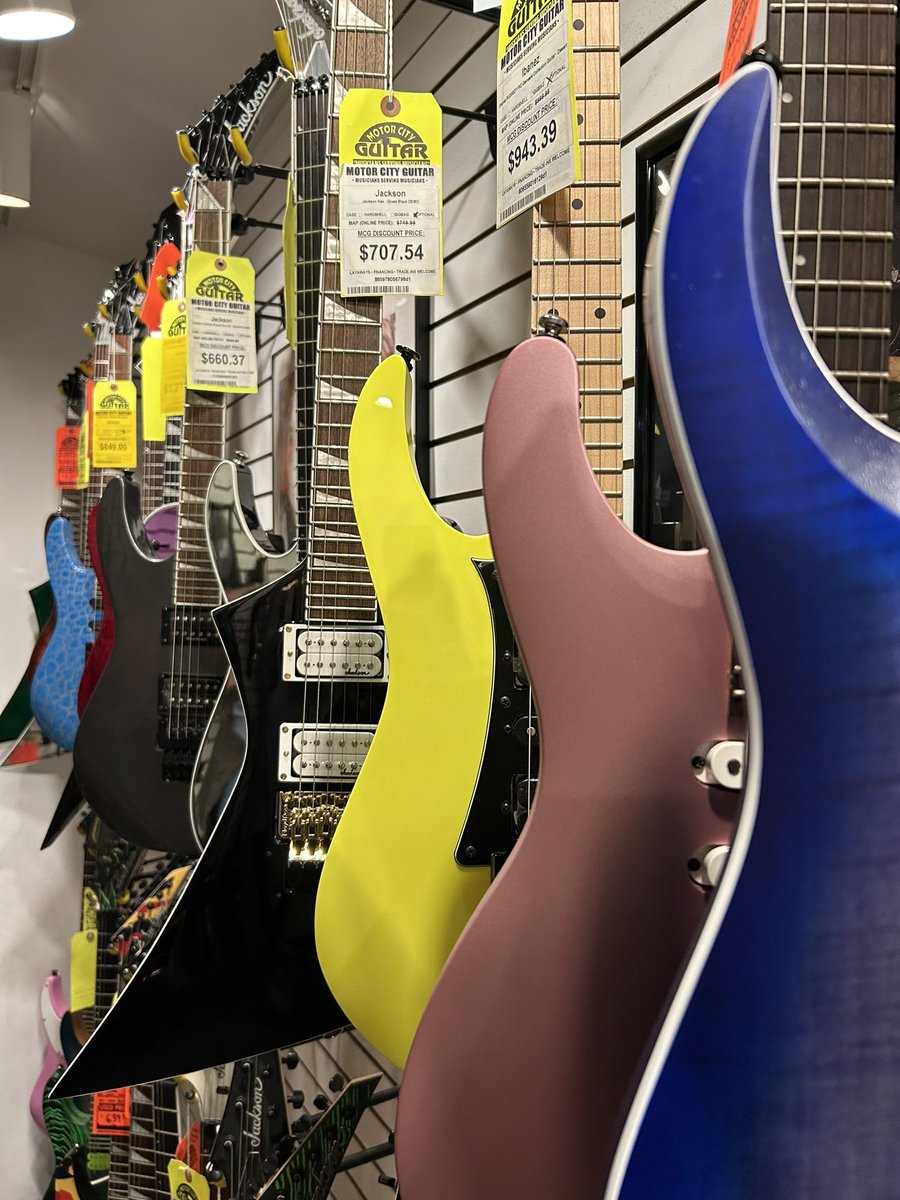 Amy1620's tweet photo. Patrick is looking at guitars at this amazing guitar shop in Waterford. https://t.co/mqEbvLGZhT
