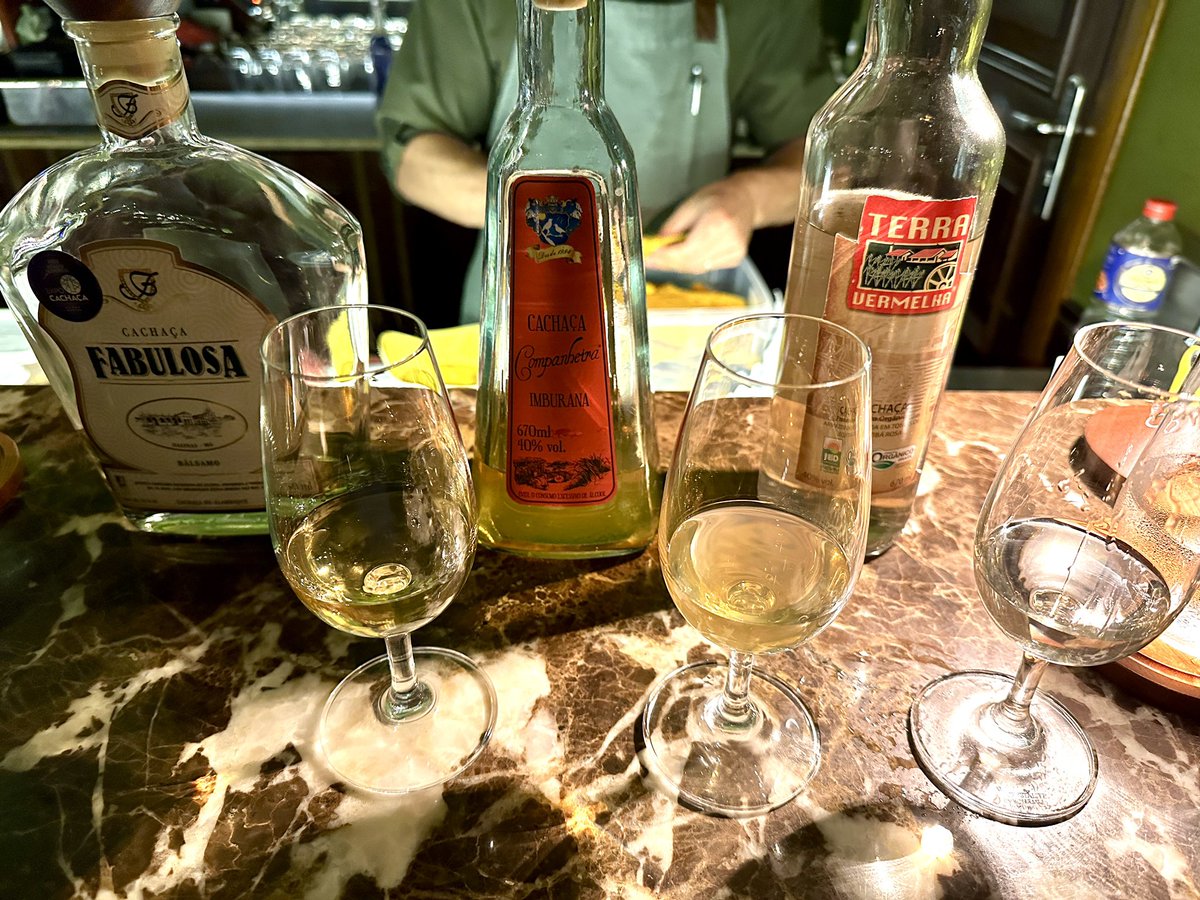 RobiMangia's tweet photo. Last night at Bar Tarobá in the @Belmond Cataratas 🌴 Another Cachaça flight, this time with different wood barrels. Chatted up Antonio who used to be a sushi Chef for 14 years and he offered me some of the Beef Tartar he was making. Excellent! 🥃 https://t.co/8iyKRI5D3f