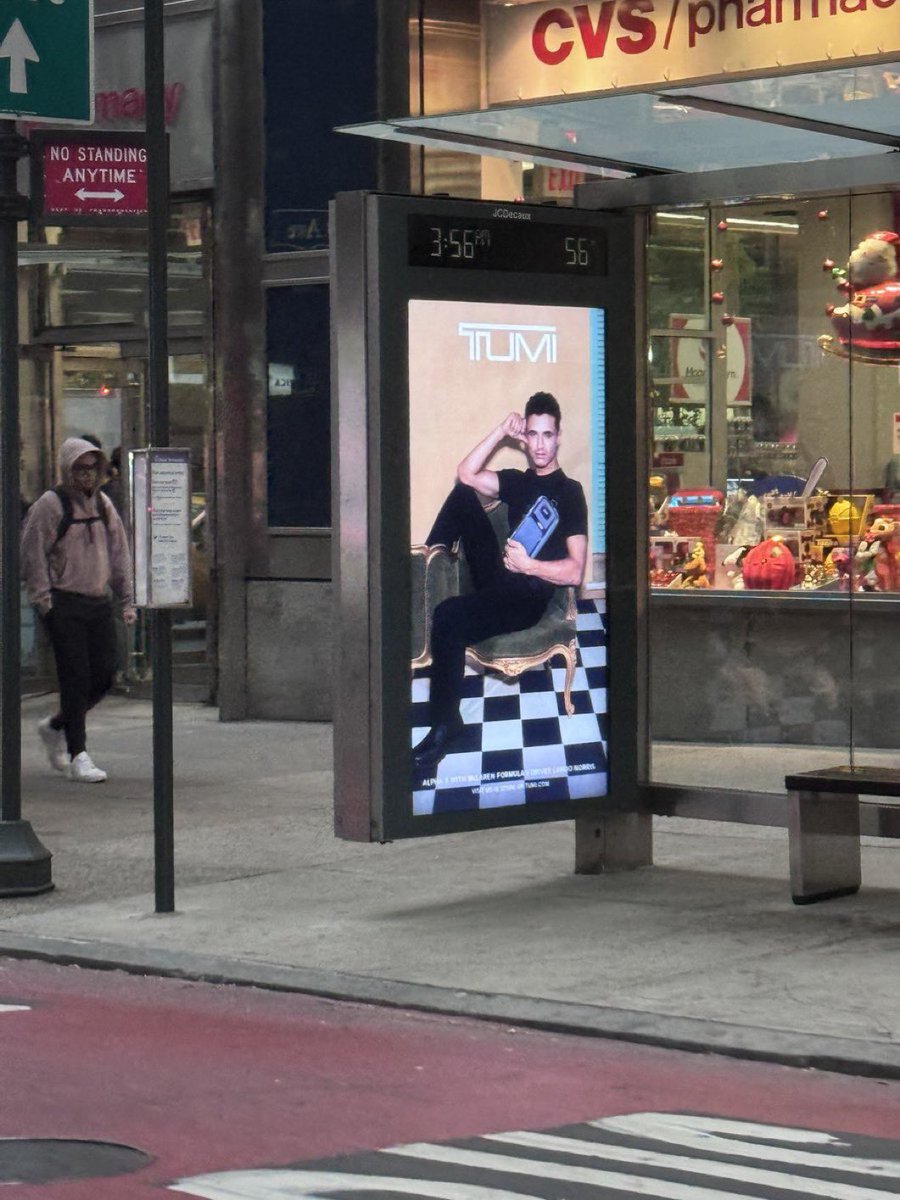 LN4JOLLY's tweet photo. One of my best friends sent me this from NYC and I just have to say that Lando has grown a lot! first he got ignored at the bus stop and now he is the bus stop https://t.co/40kWIQ7CMM