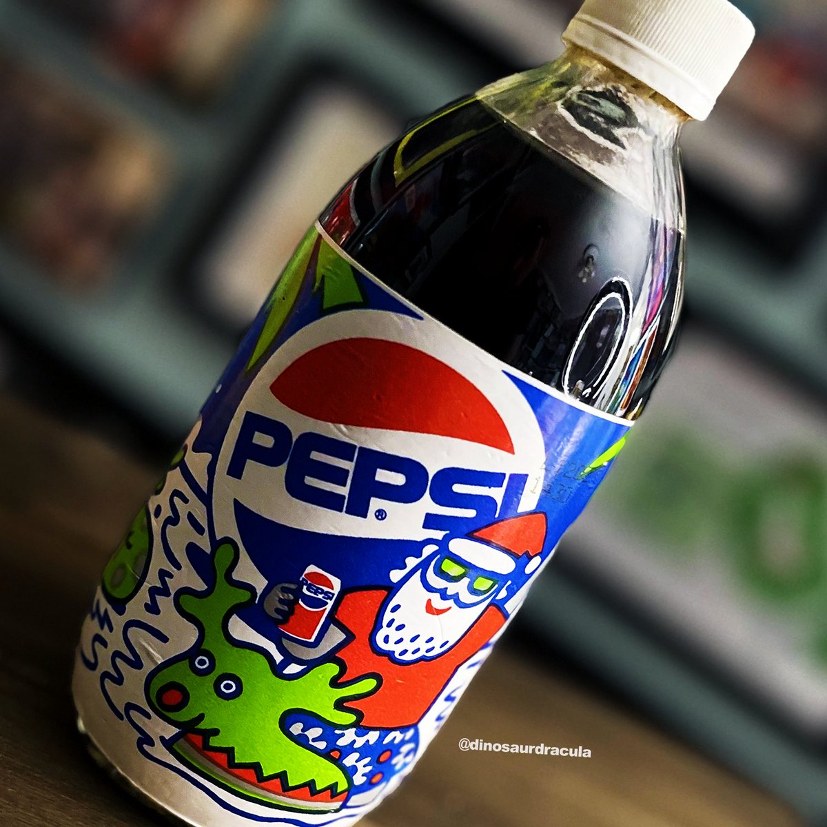 DinosaurDracula's tweet photo. Pepsi "Winter Cool" bottle from 1990, featuring hip Santa and toxic Rudolph. https://t.co/YLH8qpor3g