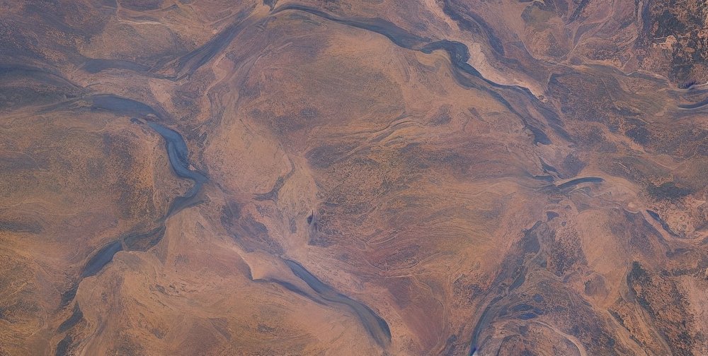 _RodolfoOcampo's tweet image. I stumbled upon my new favorite spot in the latent space and I brought you back literally thousands of images. 

Here are some!

My prompt: 

&quot;flowing rivers in the australian desert

the abstract feeling of

soft flowing soft colors&quot;