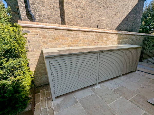 This bespoke slatted bin store is specially designed and manufactured to work on a slope. Painted in RAL 7032 (Pebble Grey) for a sleek and durable finish.

Get in touch to discuss your next bespoke project.

#BinStore #Landscaping